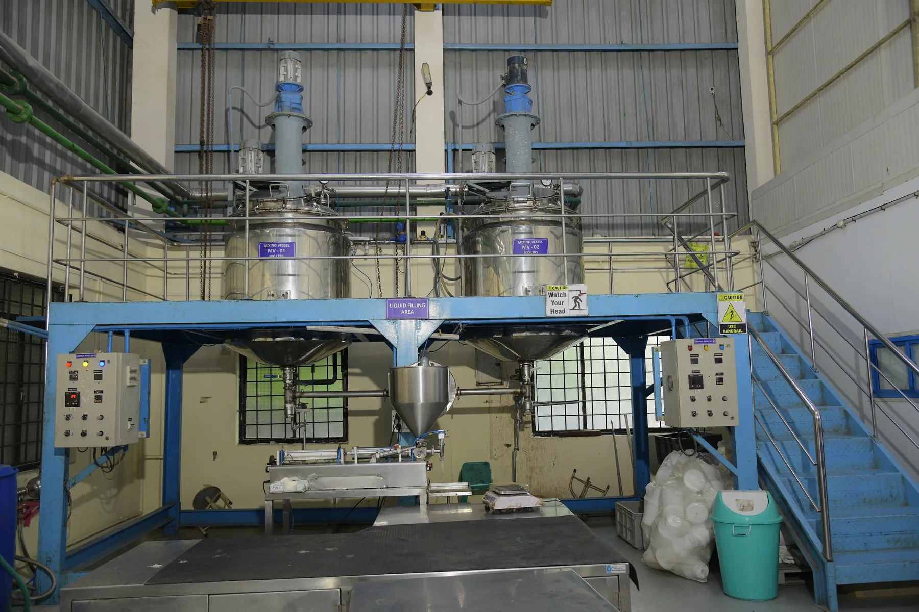 Liquid filling and packing line